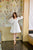 white tiered schiffli dress